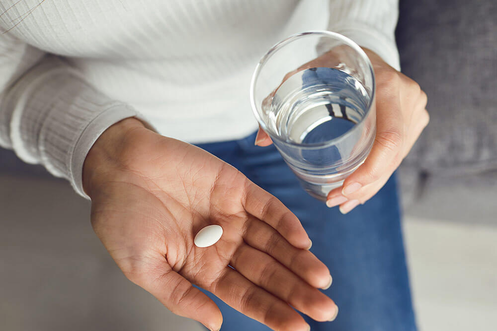 žena užívajúca železo