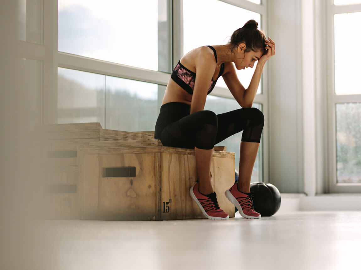 žena počas tréningu – menštruácia, únava